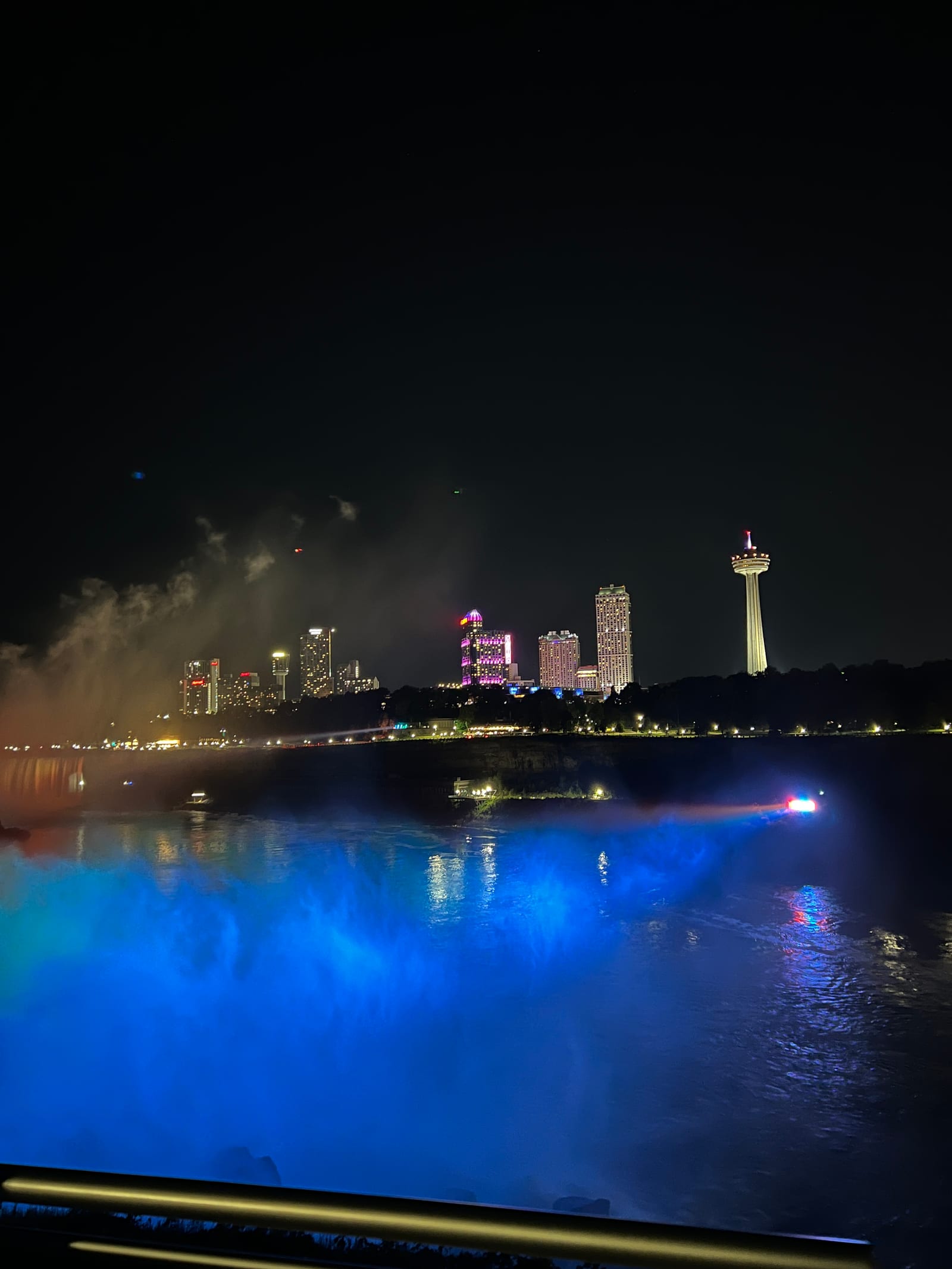 Niagara Falls illuminated at night on the Canadian side